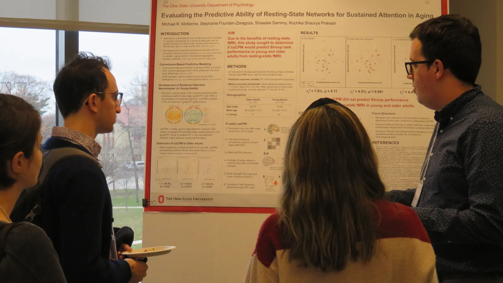 Graduate Student Mike McKenna presents his research poster